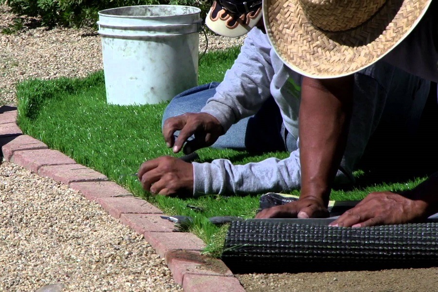 Men Installing DIY Artificial Grass